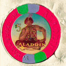 Red. 2 green, purple insets. Sitting Genie.