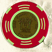 Red. 4 green insets. Bronze metal center.
