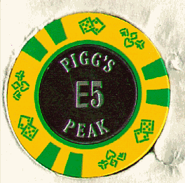 Yellow. 6 green insets. Cardsuits. metal center