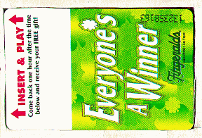 Promotion card. White/green background. Shamrocks.