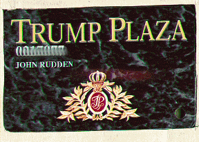 Black marble background. Trump Plaza logo.