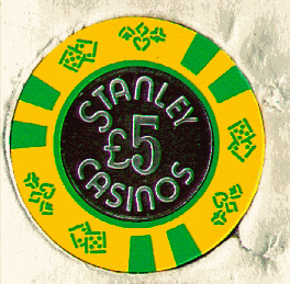 Yellow. 6 green insets. Coin inlay